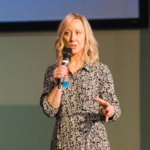 Jodie Lloyd-Jones, leadership and mindset coach at Invest in You Coaching, speaking at an event